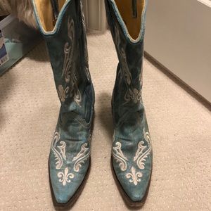Blue embroidered cowboy boots.